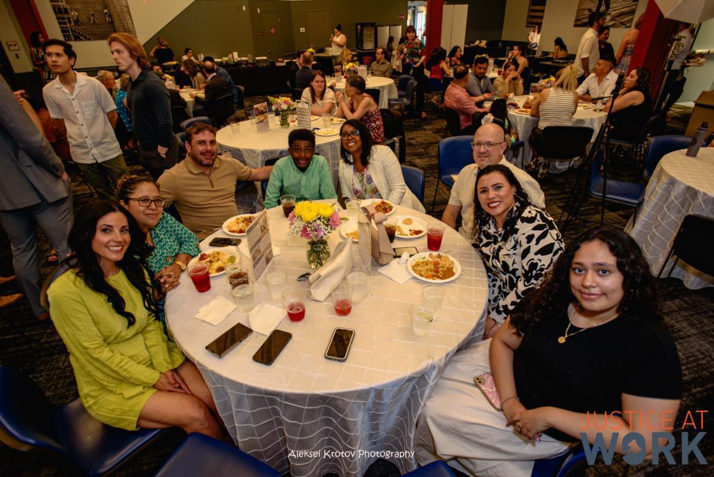 People dining at a large social event.