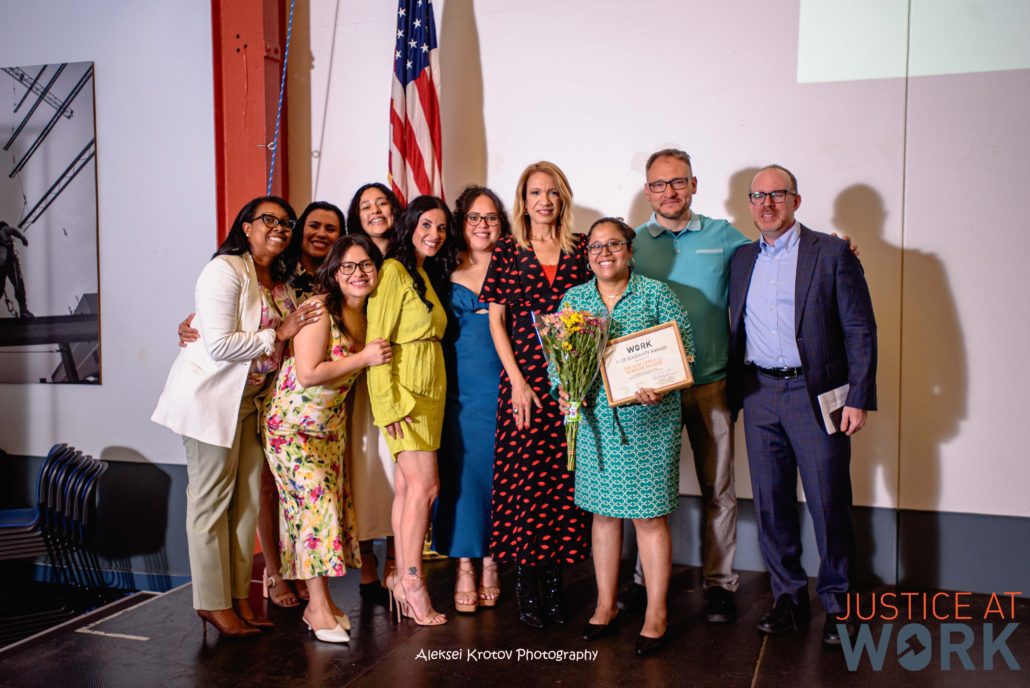 Group of people at an award event.